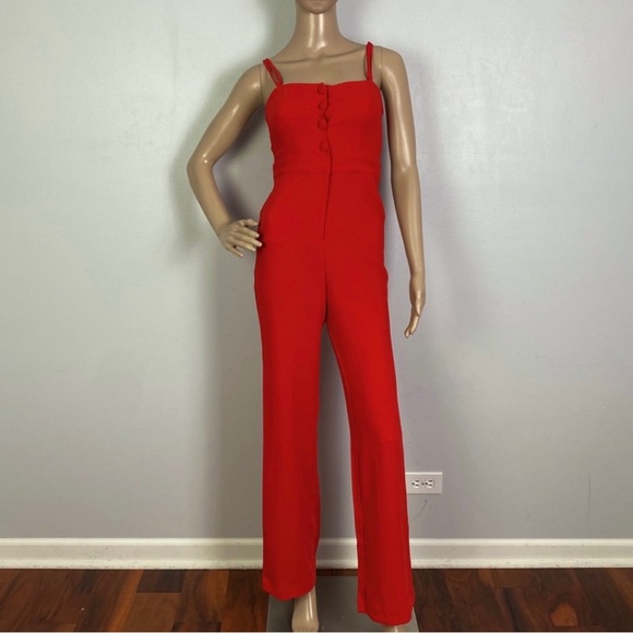 NEW NBD REVOLVE RED BUTTON-FRONT JUMPSUIT - Picture 2 of 7